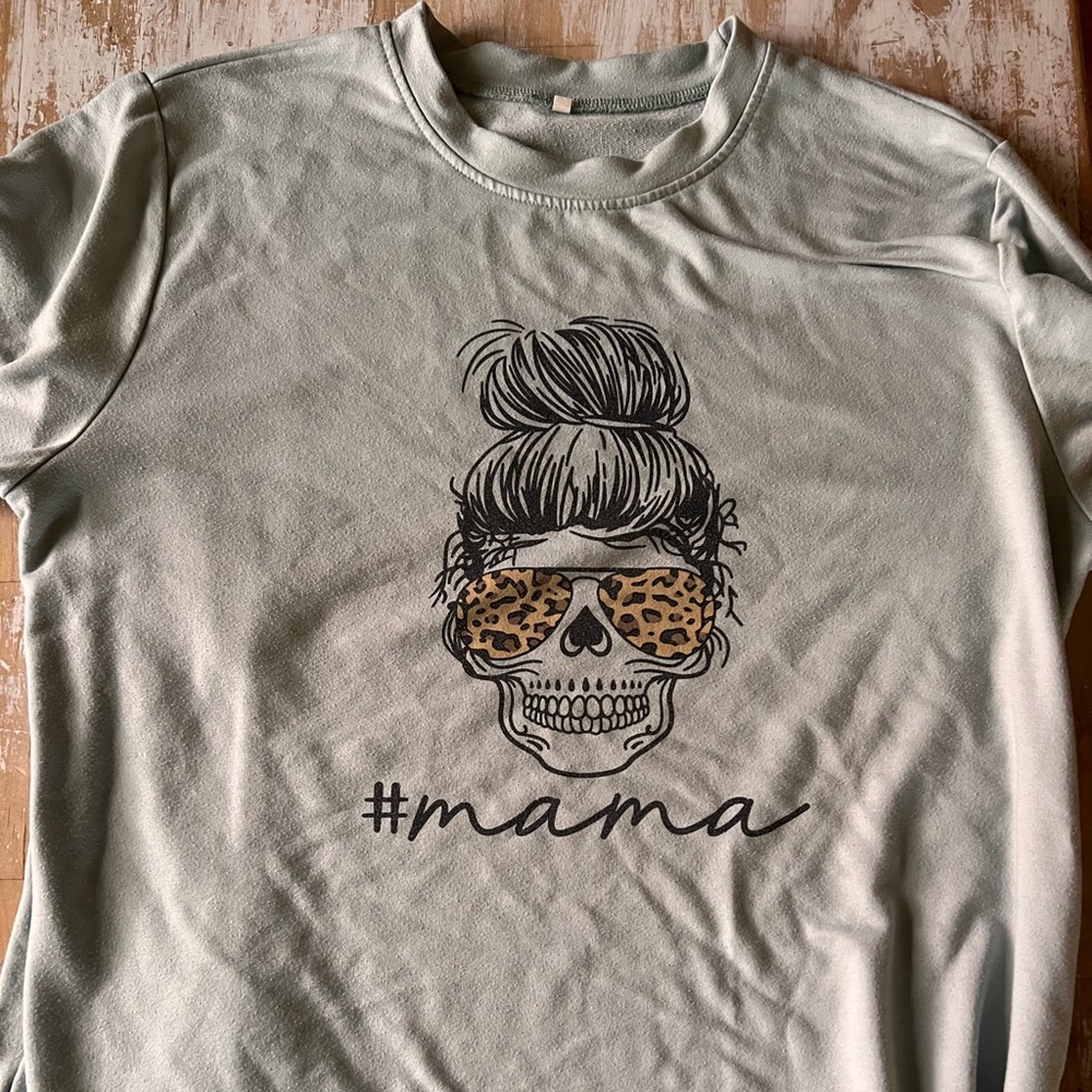 Light Blue “Mama” Skull Pull Over